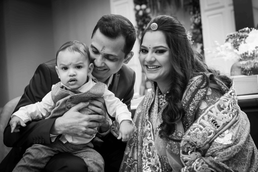 A Cute Baby with his Parents Picture by Shah Cinepix